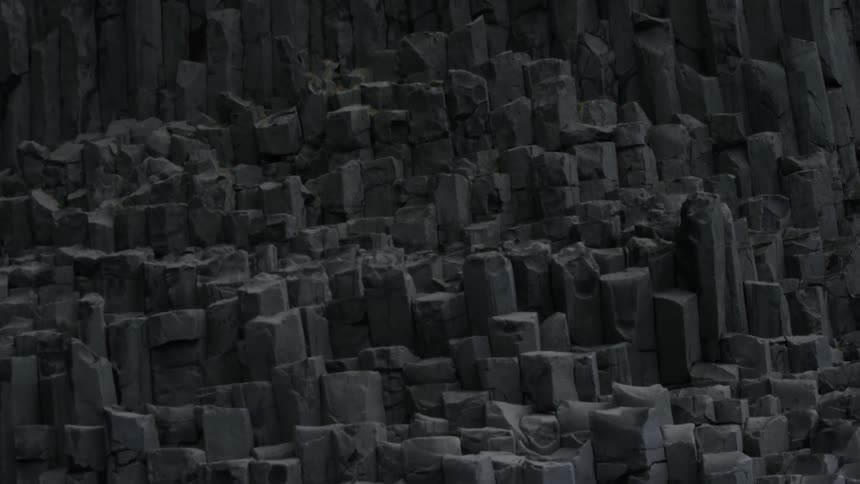 A very steep rocky mountain with many different stones lead up