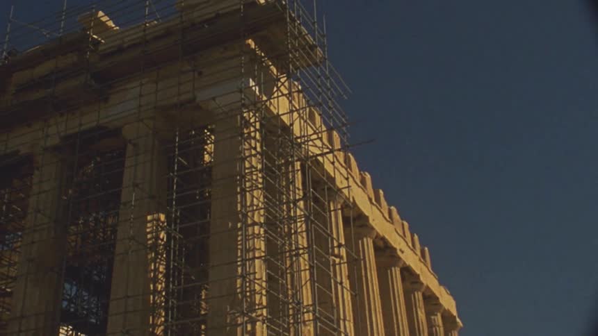 Scaffolding is set up outside a large monument