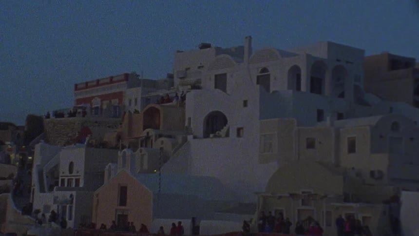 City buildings in foreign town at dusk