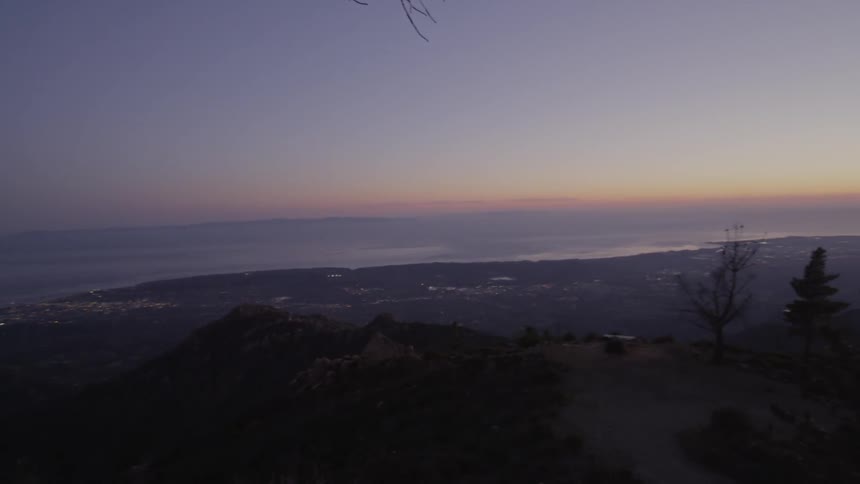 A mountainous coast at sunrise
