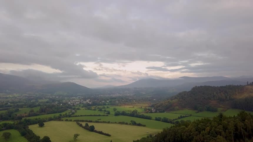 The clouds are heavy above the valley ahead