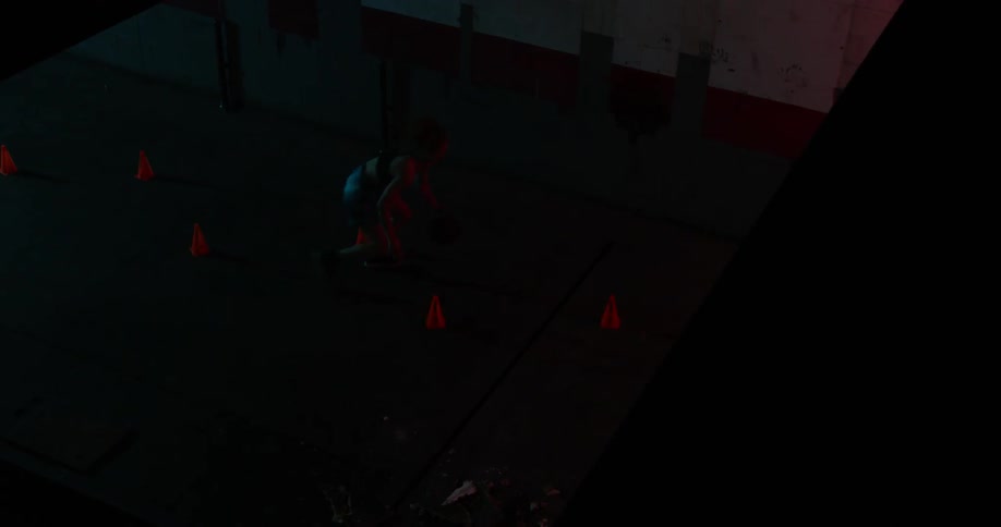 A woman dribbles a basketball through a cone drill