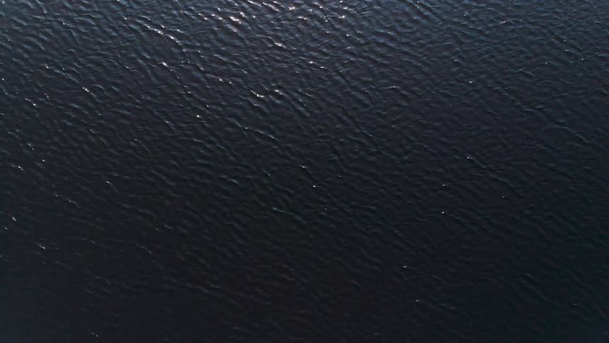 The ocean tide ripples and undulates