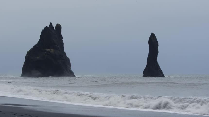 Waves crash on a rocky beach