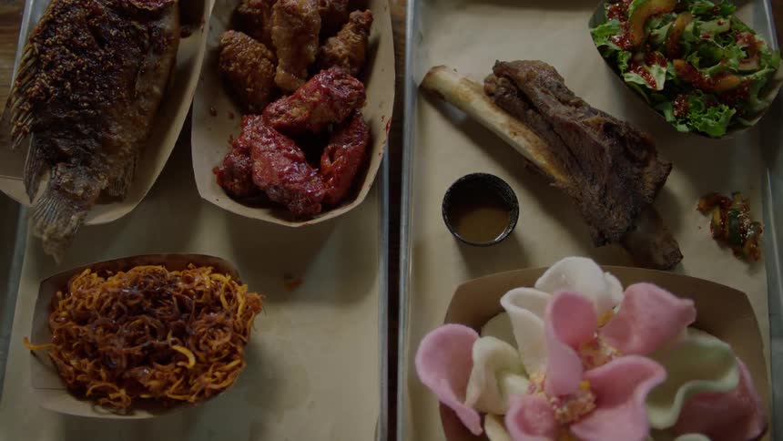 The trays are filled with tasty food