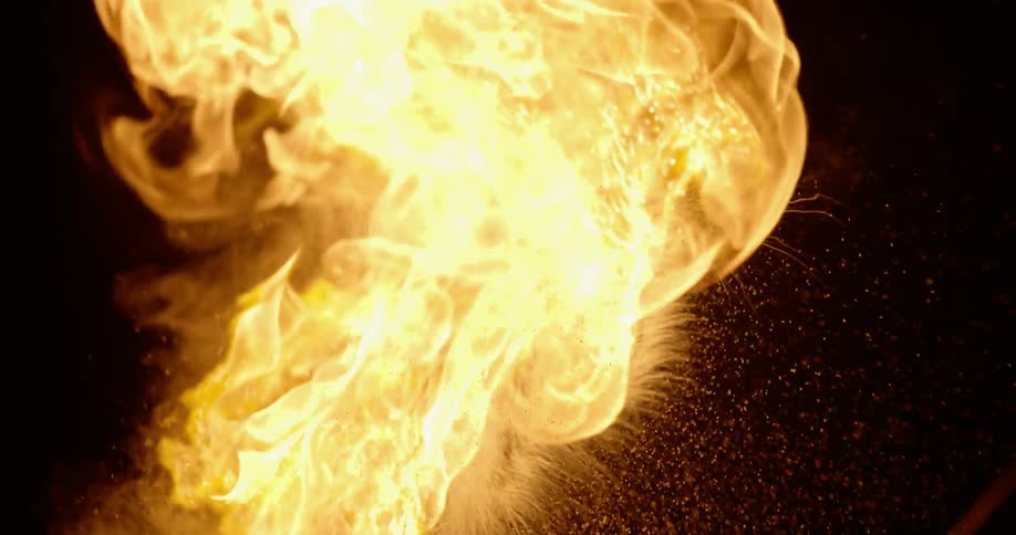 A torch blazes alight