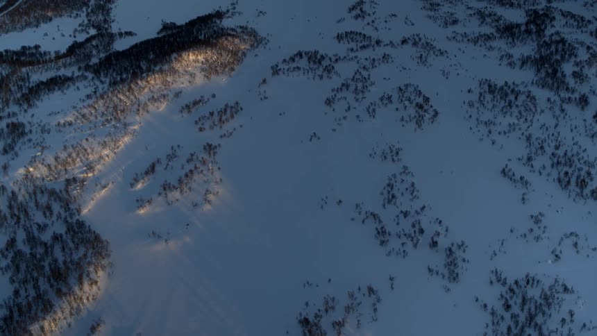 Snow covers the ground in the mountains