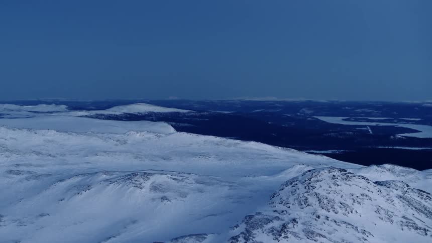 The mountains is completely covered with ice