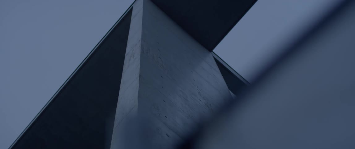 The building is tall with flat sides