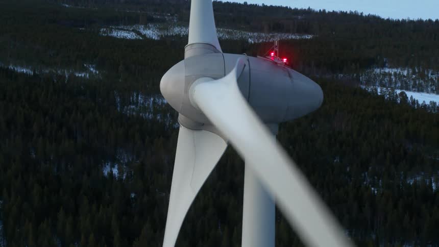 Close up of spinning wind turbines