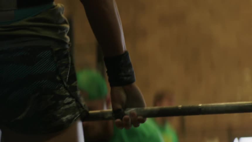 People are working out in a gym with weights