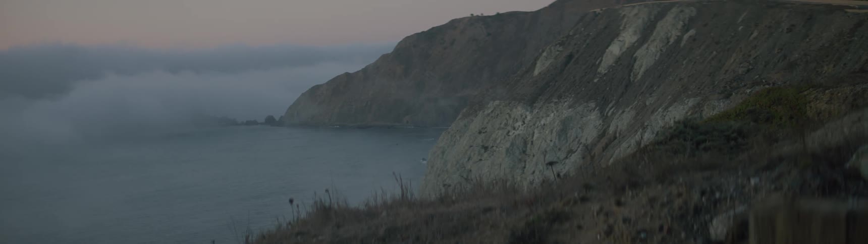 Cliffs surrounding a body of water