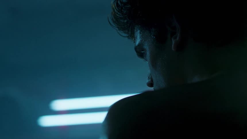 A young man is deep in thought