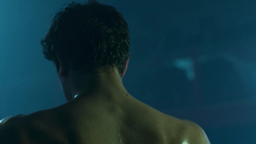 Man with a wet back moves forward