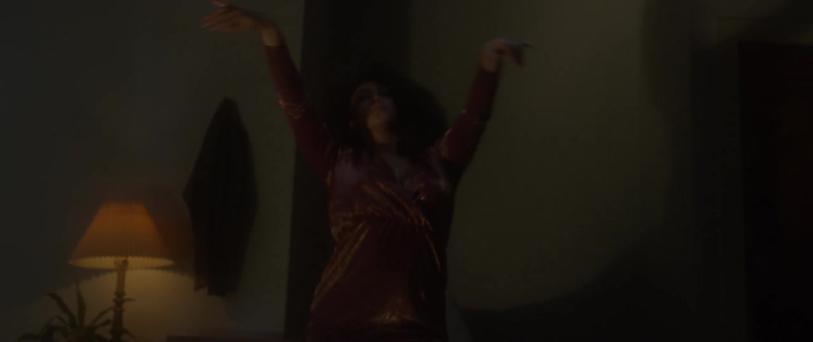 Woman moves her arms in an interpretive dance move