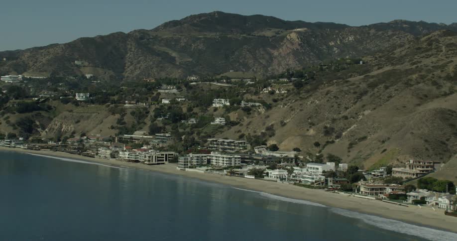 A coastal town in California is shown on a clear day