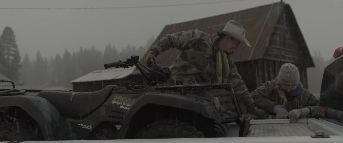 Man and woman with an off road vehicle