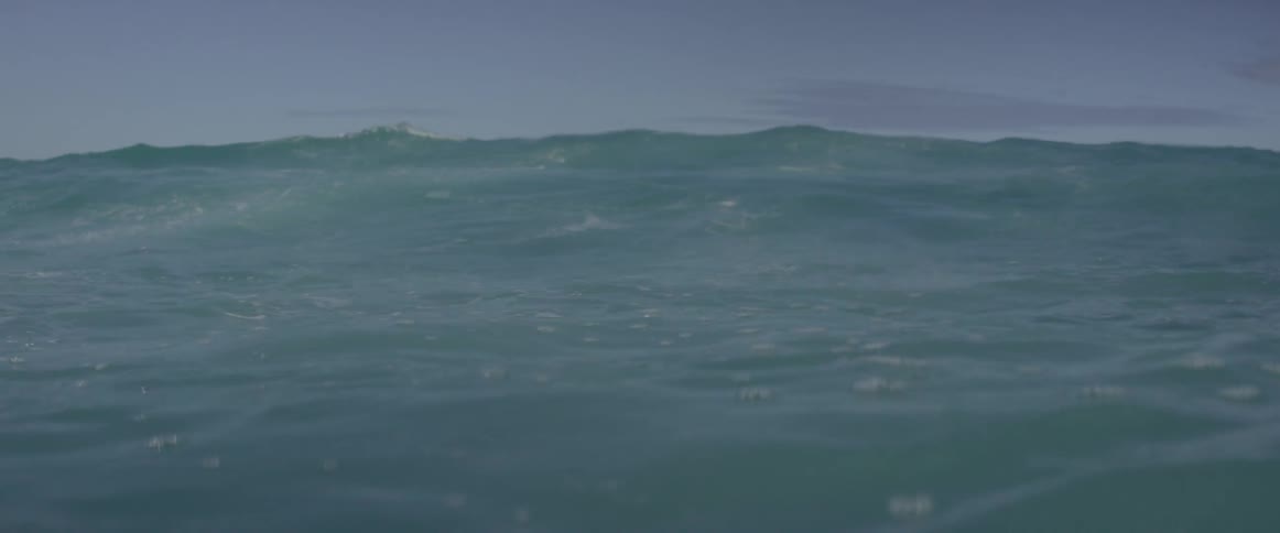 Waves are crashing into the camera