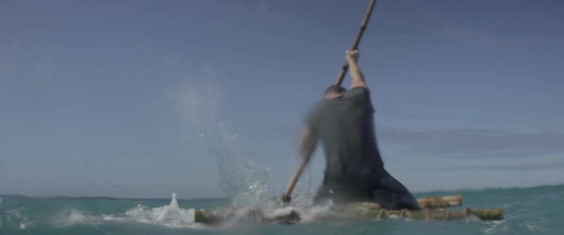 Person kayaking on a large body of water