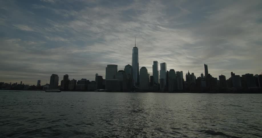 A coastal city skyline on a cloudy day