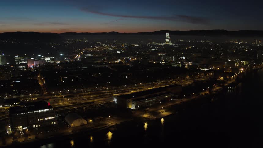 Aerial view of a city lit up at night