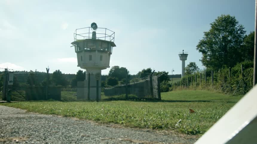 Tall building in the middle of a field