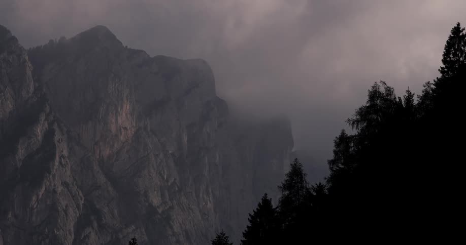 Fog and haze flow in the air above a mountain