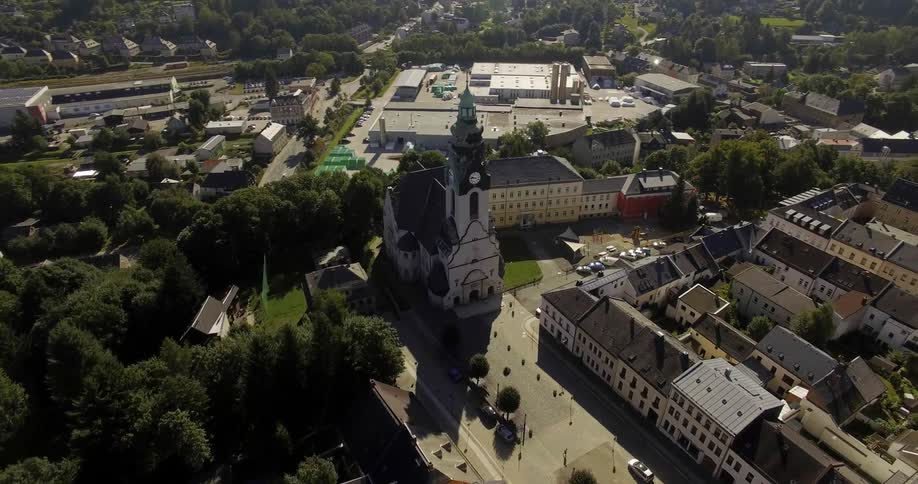 A clock tower is in the middle of this town