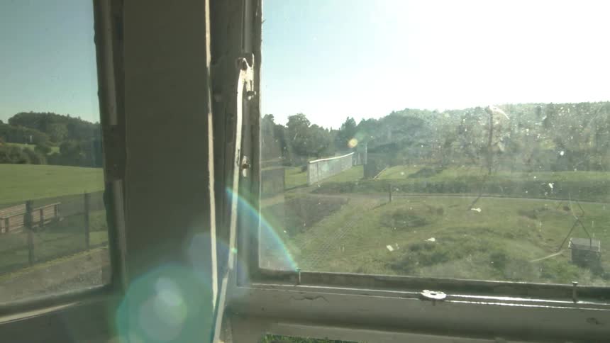 The sun shines in through the windows of watchtower on a sunny day