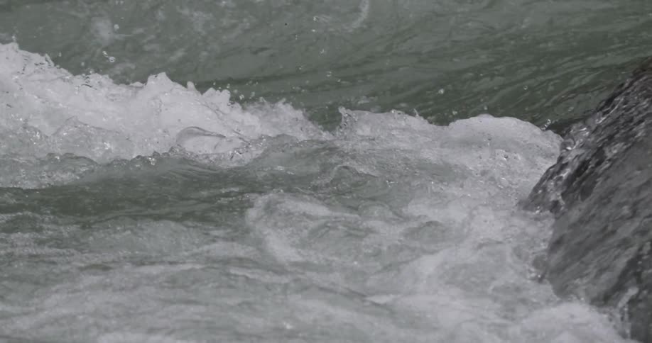 Slow motion video of raging rapids