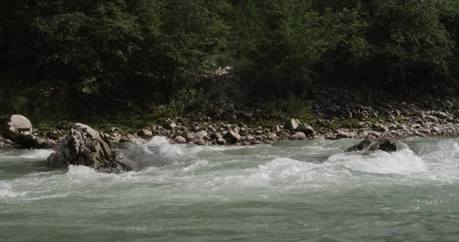 The water moves fast crashing off the rocks