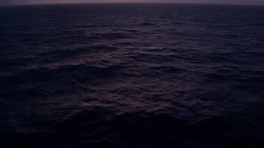 Large body of water flowing and creating waves