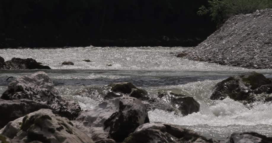 The rapids are rough on a sunny day