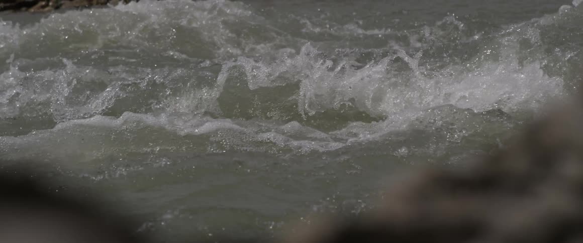 Water rapids flow in a river