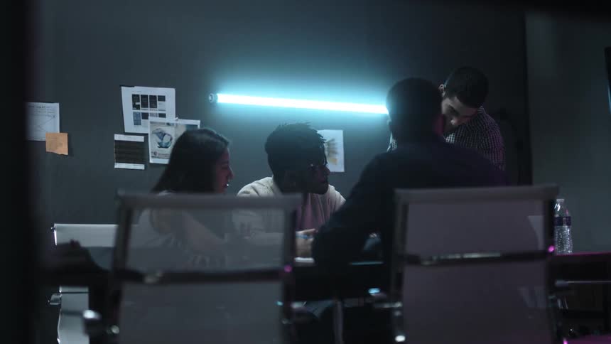 People work together on a project in an office