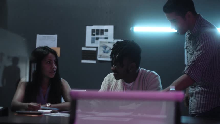 Employees collaborate in an office