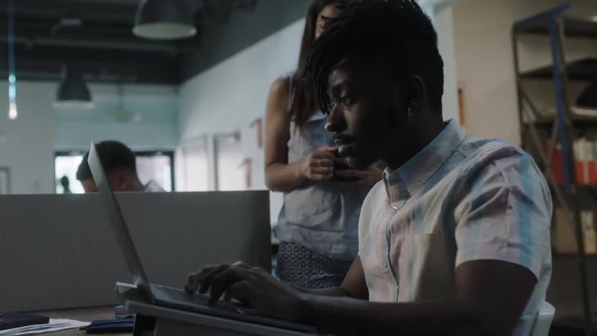 People work inside a modern office