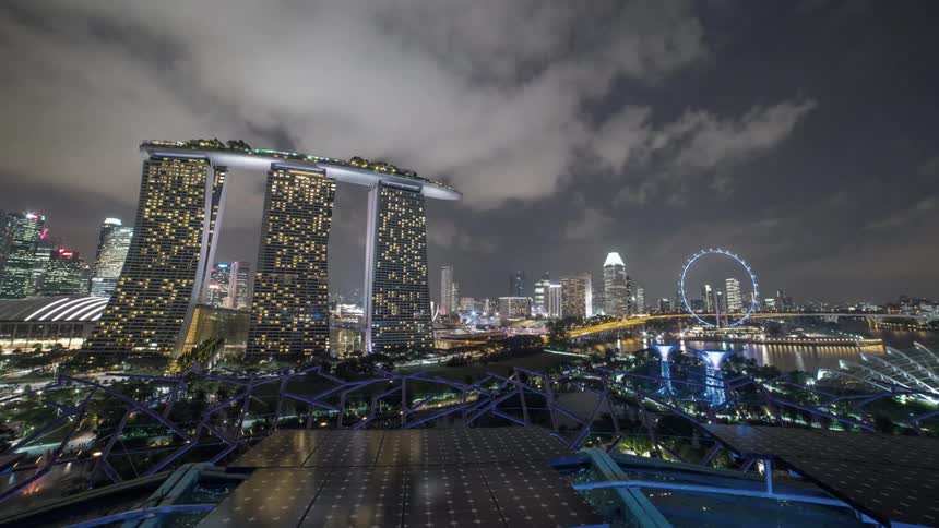 A timelapse video of night falling over a metropolitan city
