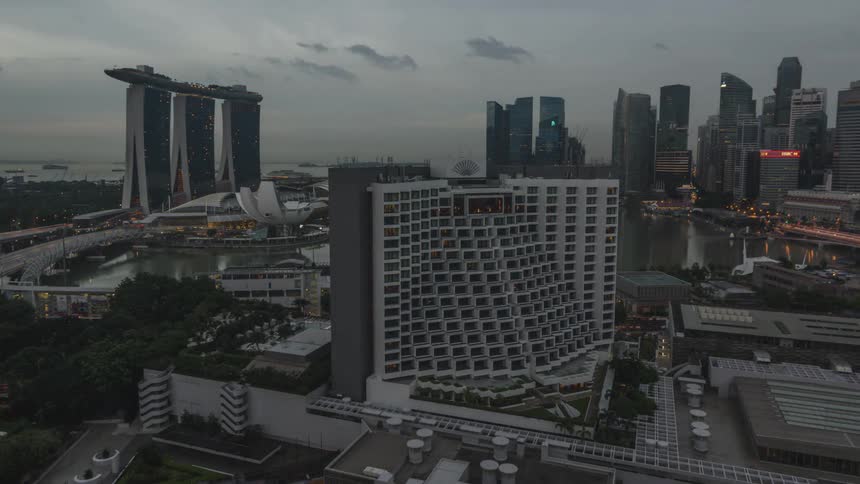 Time lapse of traffic in a city at dawn on a cloudy day