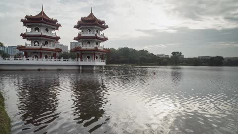 A time lapse of an asian town near the water