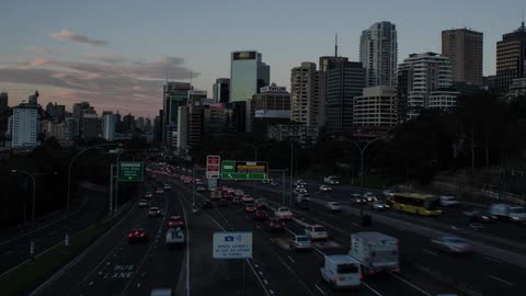 Time lapse of a busy highway during sunrise