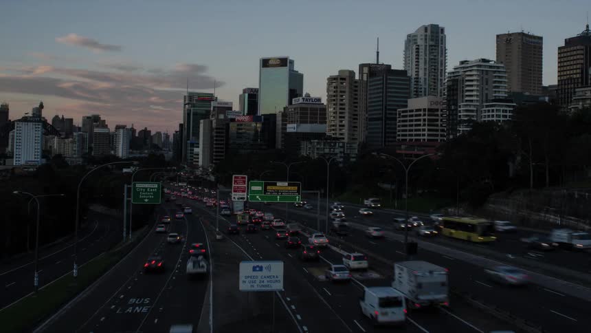 Time lapse of a busy highway during sunrise