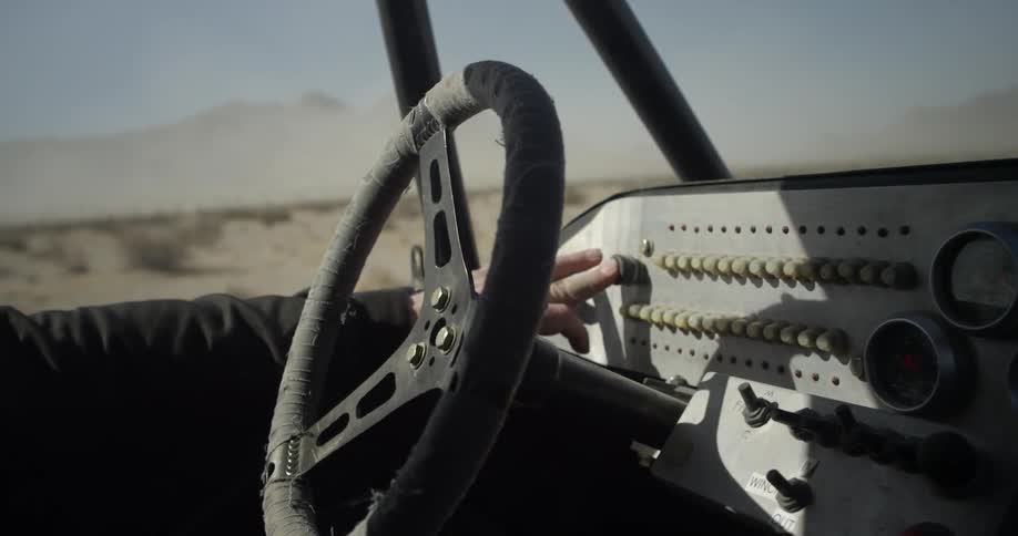 Person pushes buttons on a vehicle