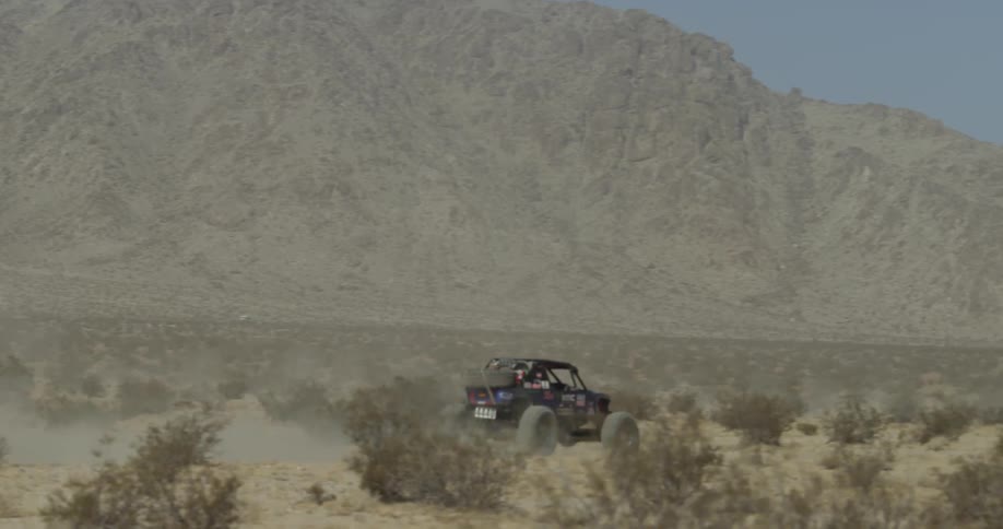 An off road vehicle in the desert