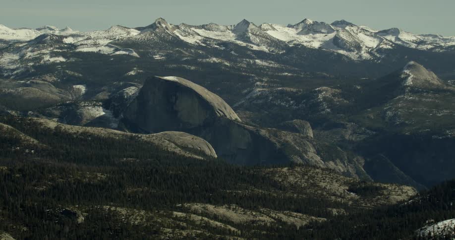 A snowy mountain range near Half Dome in Yosemite National Park, California