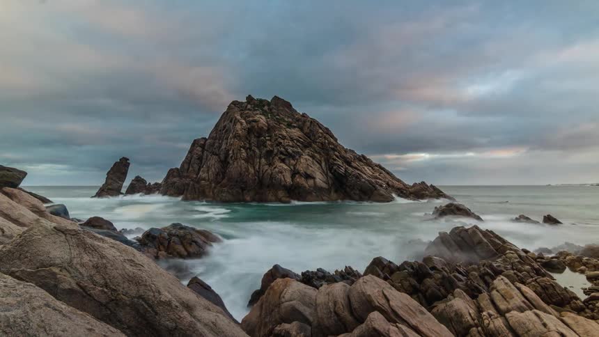 Long Exposure time lapse of rocky island on the coast