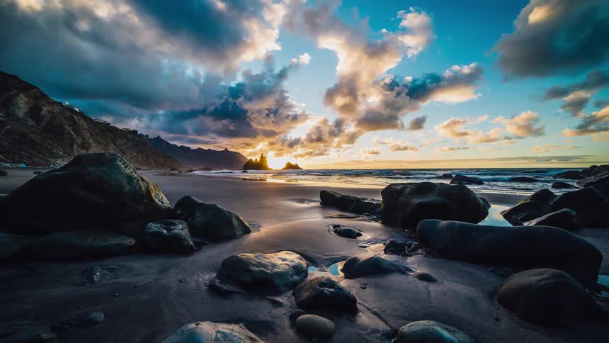 Time lapse of the tide coming and going on a beach