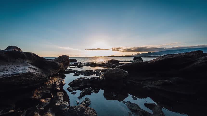 A timelapse of the sun setting over the ocean