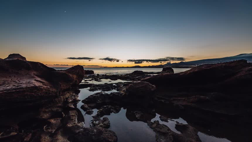 Time lapse footage of a the ocean and rocks