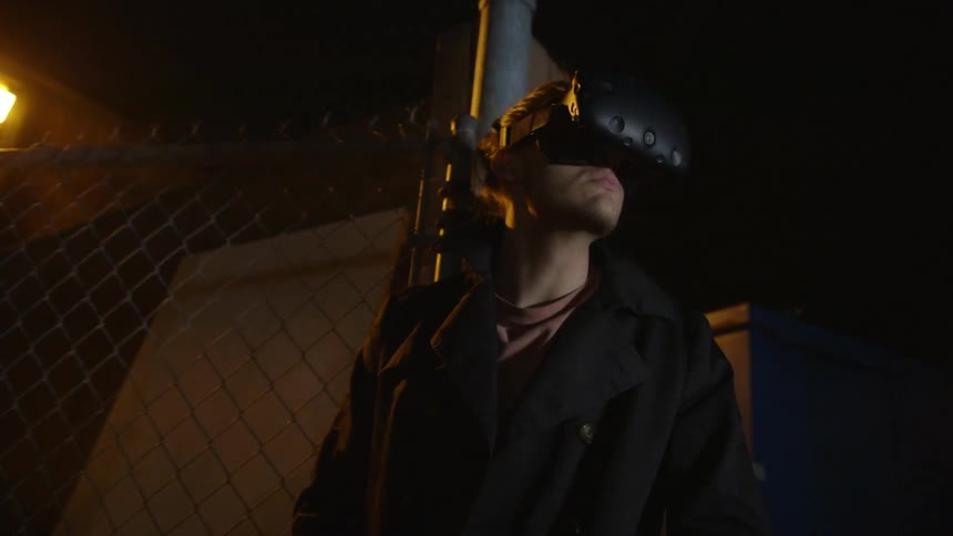 A person wearing a vr headset outside